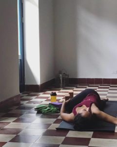Student in twist in Detox Yoga, Casco Viejo, Casco Yoga, Panama
